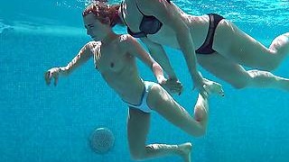 Two Bikinis Girls Get Naked In The Pool For A Swim